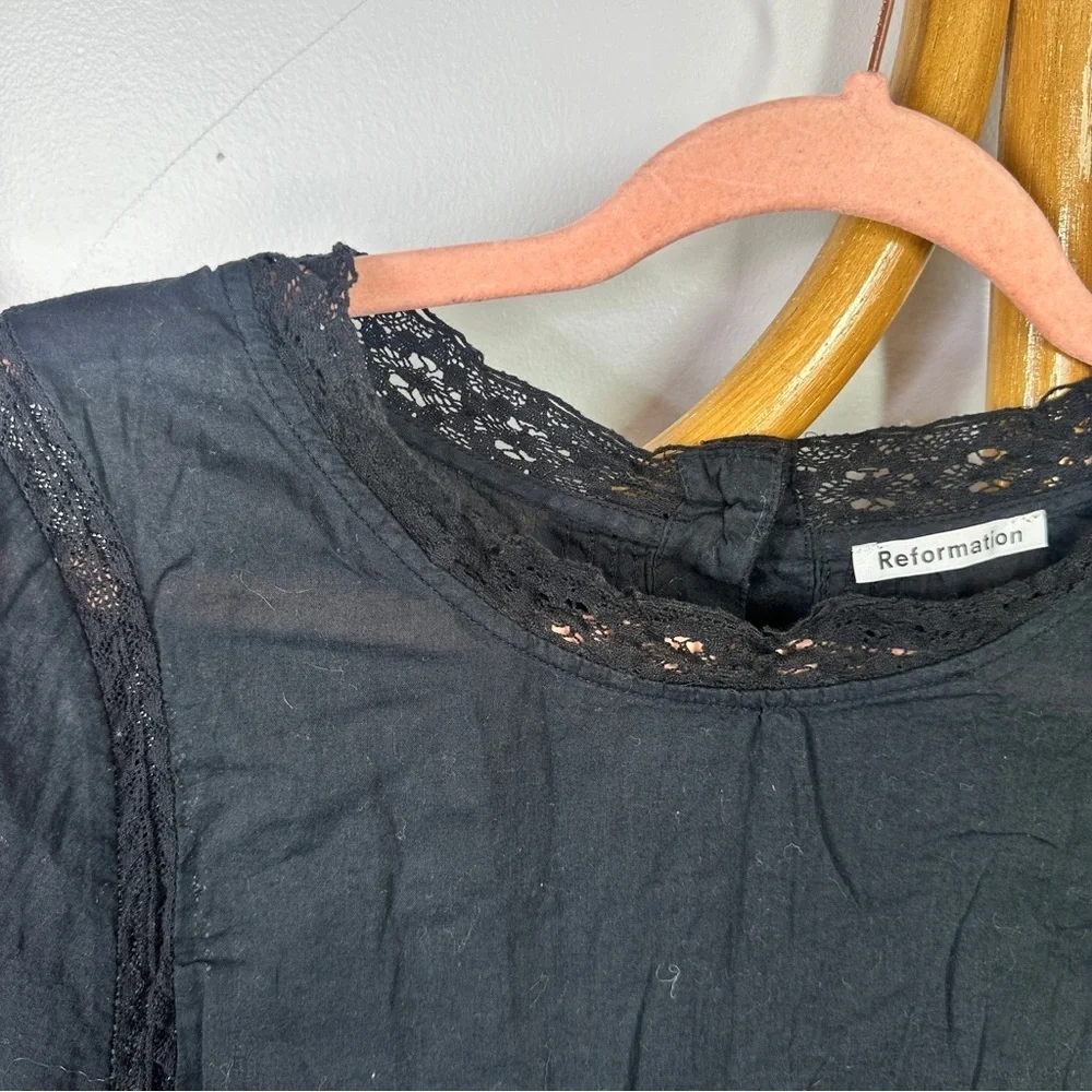 Reformation black sleeve